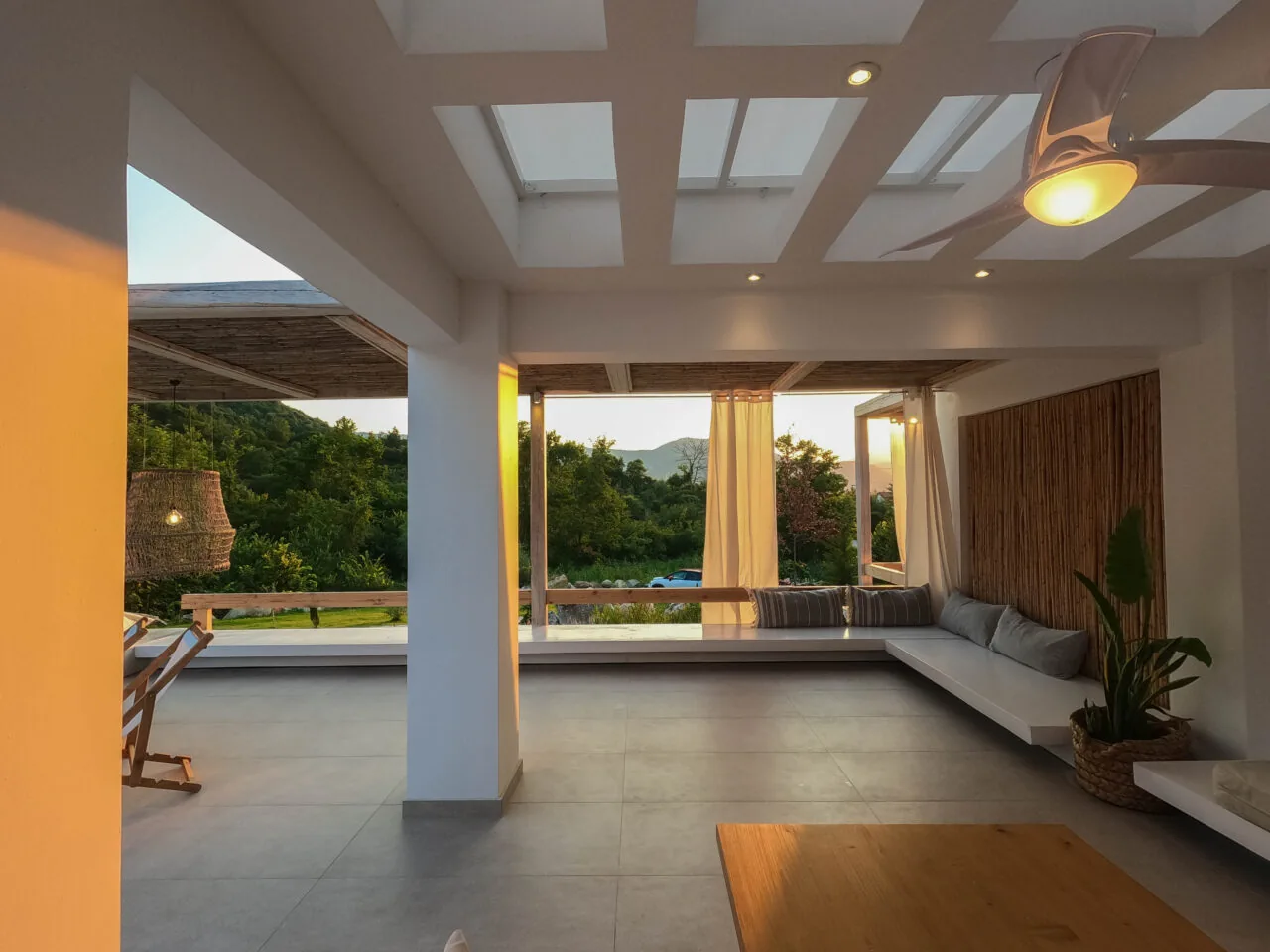 Open lounge overlooking nature at sunset